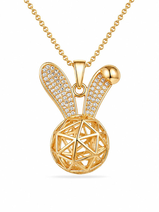 Bunny pendant necklace with pavé CZ left ear, polished gold orb right ear and hollow geodesic sphere body on rolo chain